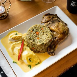 Arroz Con Pollo Y Huancaina