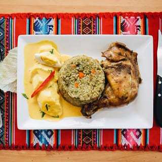 Arroz Con Pollo Y Huancaina